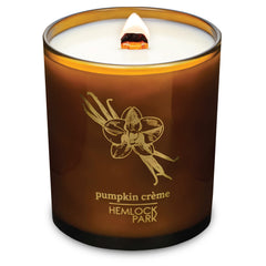 Hemlock Park Amber & Gold Wood Wick Candle with coconut wax, creates cozy ambience.