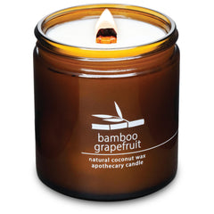 Hemlock Park crackling wood wick candle 16 oz in bamboo grapefruit scent for cozy evenings.