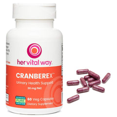 Cranberex capsules beside a glass of water for convenient intake.