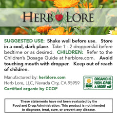 Glass of water beside Herb Lore GoodNight bottle for easy use.