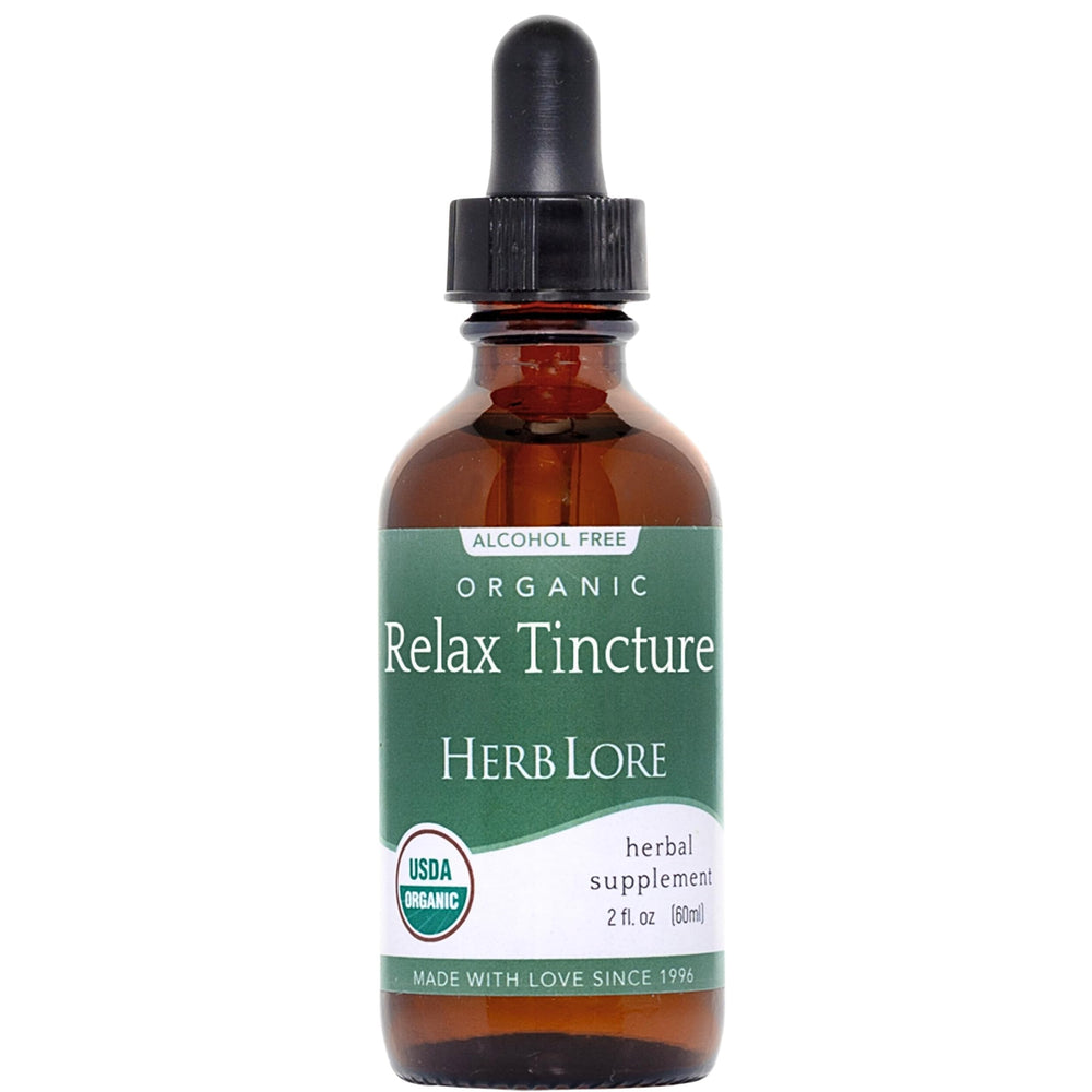Herb Lore Relax Tincture bottle on a wooden surface promotes calm evenings.