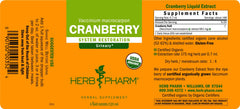 Herb Pharm cranberry liquid bottle pouring suggests quick absorption use.