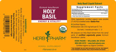 Glass of water with Herb Pharm Holy Basil ready to enjoy.