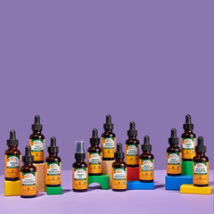Herb Pharm kids bottle shown with juice for easy use.