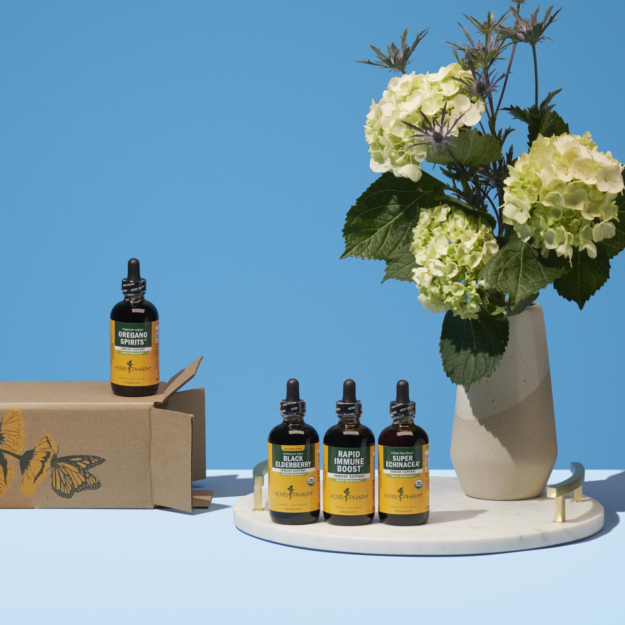 Herb Pharm Oregano Spirits organic certifications badge visible on packaging.