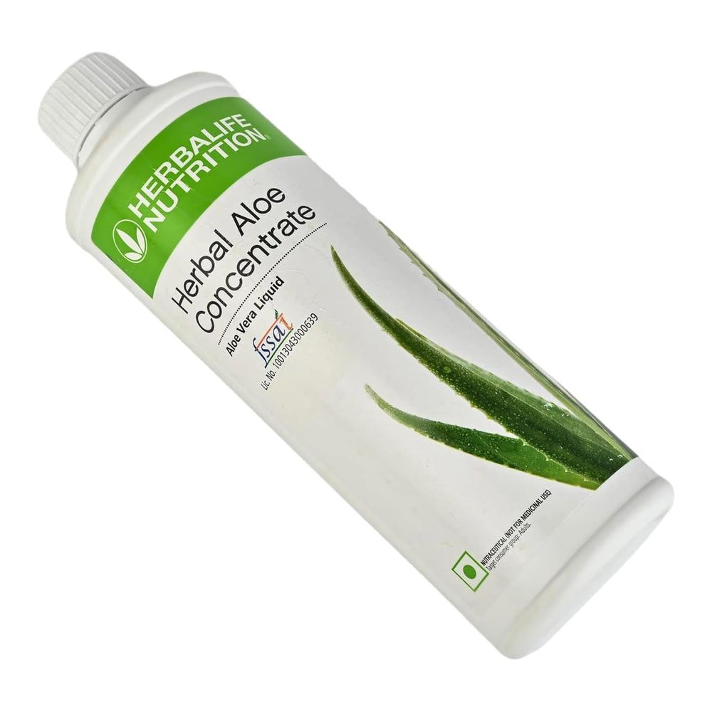 Herbalife Aloe Cranberry Concentrate pour—ready-to-drink option after meals.
