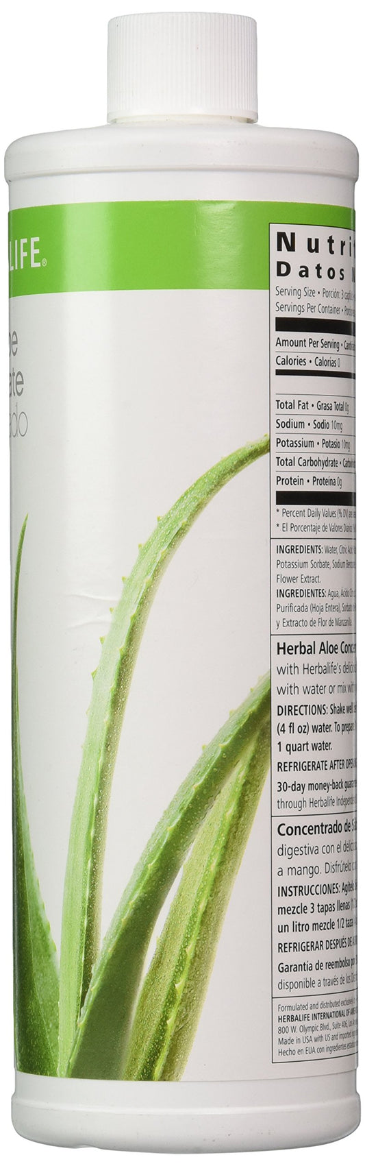 Herbalife Herbal Aloe Drink Mango concentrate poured into a glass for refreshing hydration.