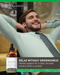 Herbalogic Quiet Mind drops in hand conveying a soothing plant-based routine
