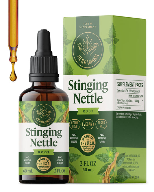 HERBAMAMA Stinging Nettle tincture bottle on wood for daily urinary wellness.