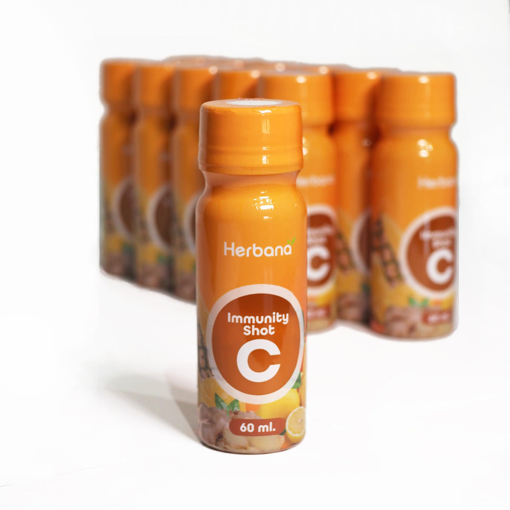 HERBANA Immunity & Digestive Shot packaging; 12-pack for everyday wellness on the go.