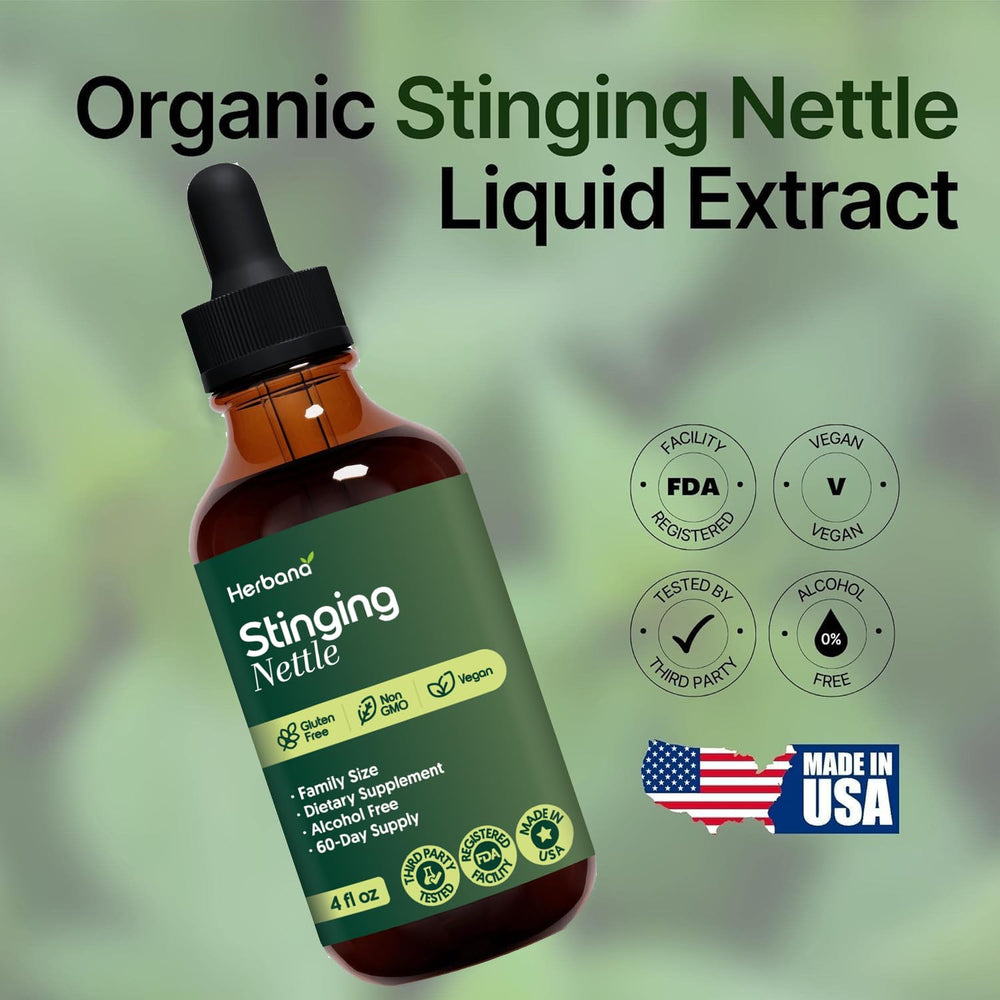 HERBANA nettle tincture dropper releasing liquid for easy daily use.