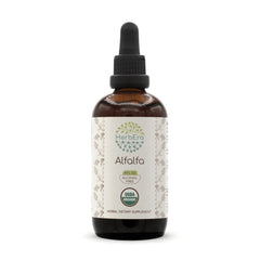 HerbEra Alfalfa tincture bottle with alcohol-free daily drops on wood