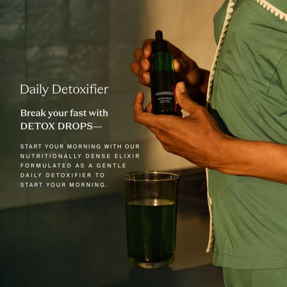 HigherDOSE Detox Drops in a glass of water illustrating easy hydration and detox.