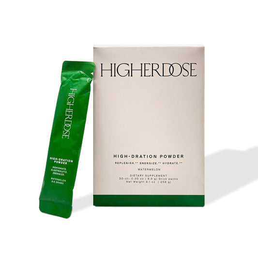 HigherDOSE HIGH-DRATION powder with watermelon in a glass for refreshing post-workout hydration