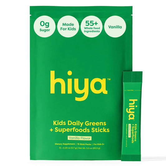 HIYA Kids Greens Powder Sticks Vanilla tub with milk for a delicious greens boost