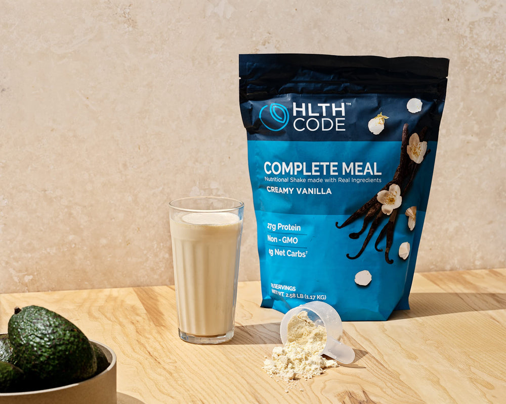 HLTH CODE Complete Meal Shake vanilla scoop visual hints at protein boost.