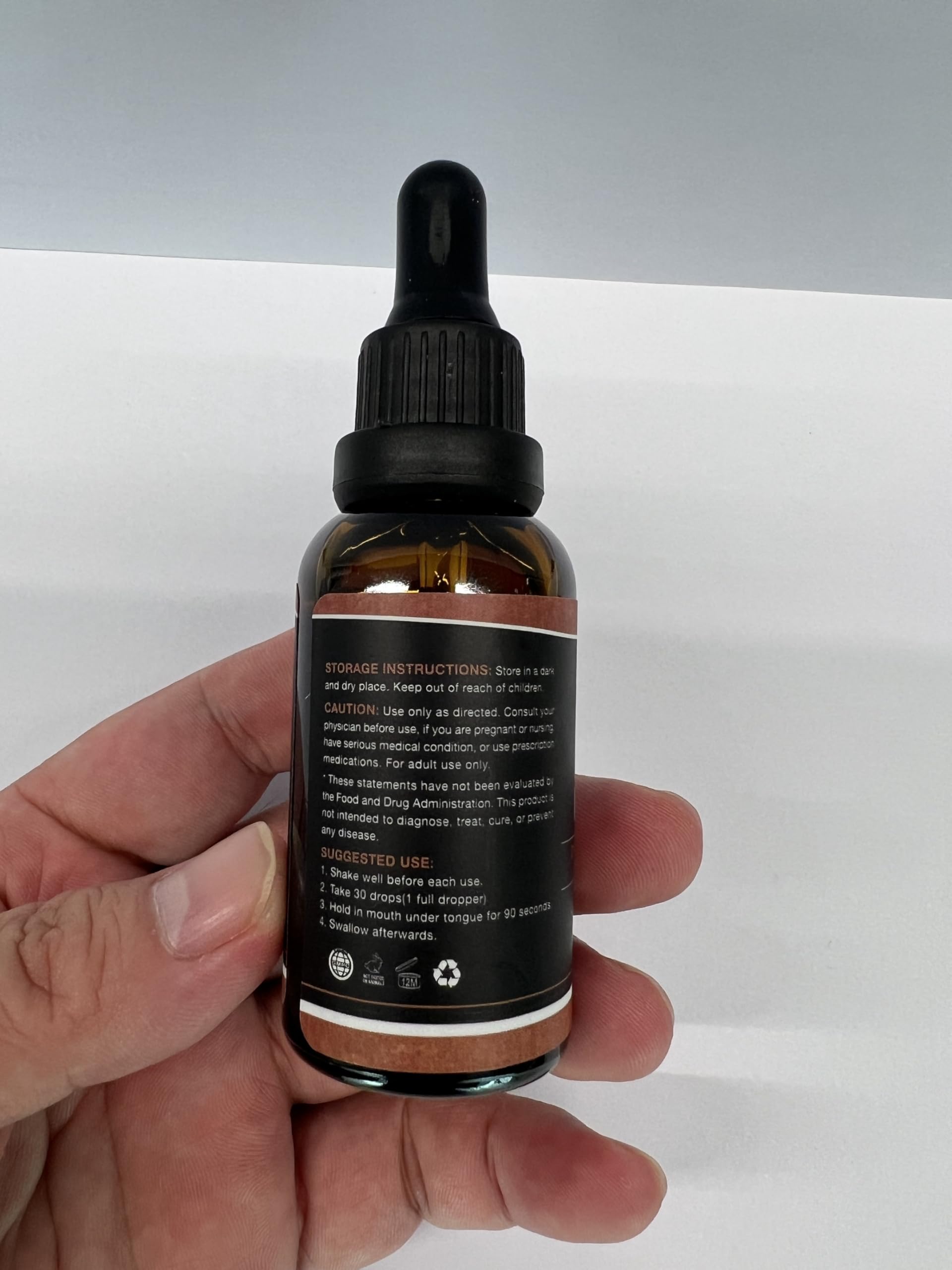 HMone Hemp Oil drops added to morning smoothie for daily routine.