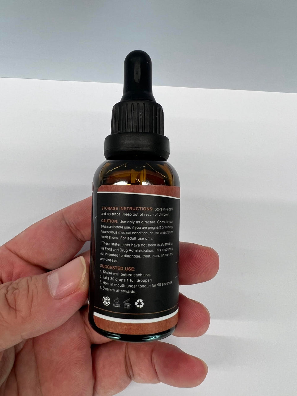 HMone Hemp Oil drops added to morning smoothie for daily routine.