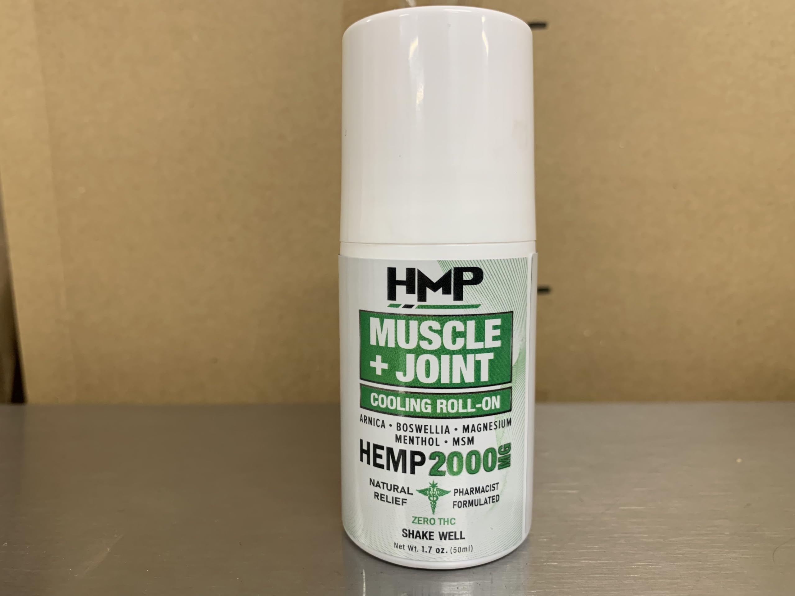 HMP Brands roll-on application close-up for targeted relief on joints