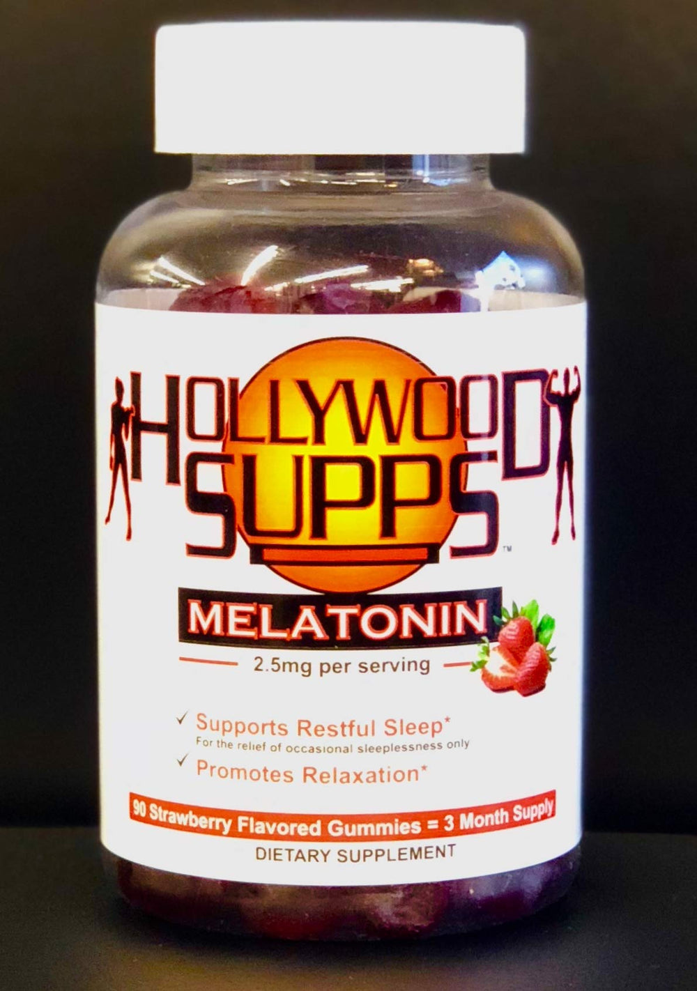 Hollywood Pro Melatonin Gummies in a dark bedroom setting for relaxation.