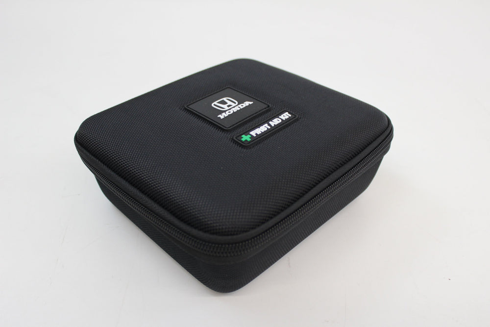Honda first aid kit contents view shows comprehensive safety supplies.