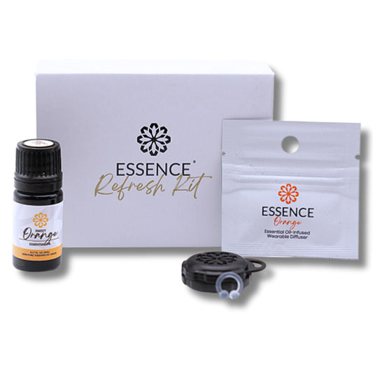 HONÉ Essence wearable diffuser orange ring closeup for discreet mood support.