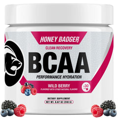 Honey Badger BCAA EAA powder tub in wild berry flavor for post-workout recovery.