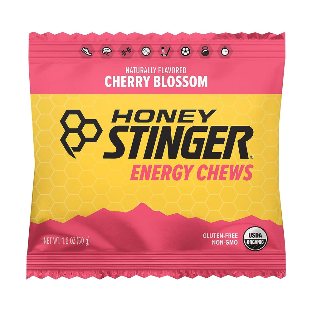 Athlete uses Honey Stinger Cherry Blossom chews during run for sustained energy.