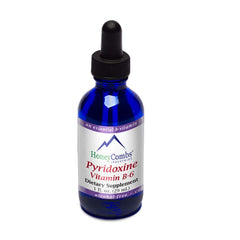 Pouring HoneyCombs Vitamin B6 Drops demonstrates easy dosing for daily energy and mood support.