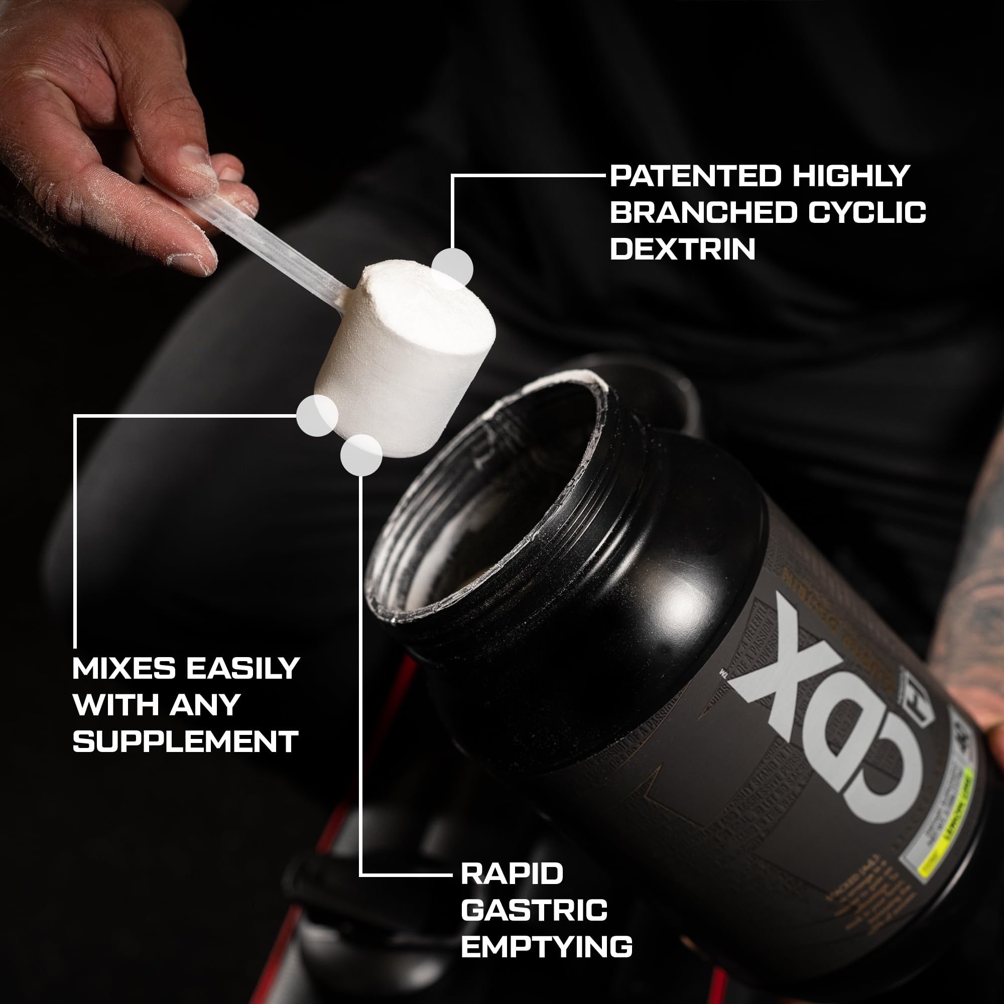 HOSSTILE CDX powder being poured highlights a clean carbohydrate source for post-workout recovery.