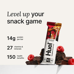 Huel Complete Nutrition bar Dark Chocolate Raspberry caramel layer close-up emphasizes interior layers