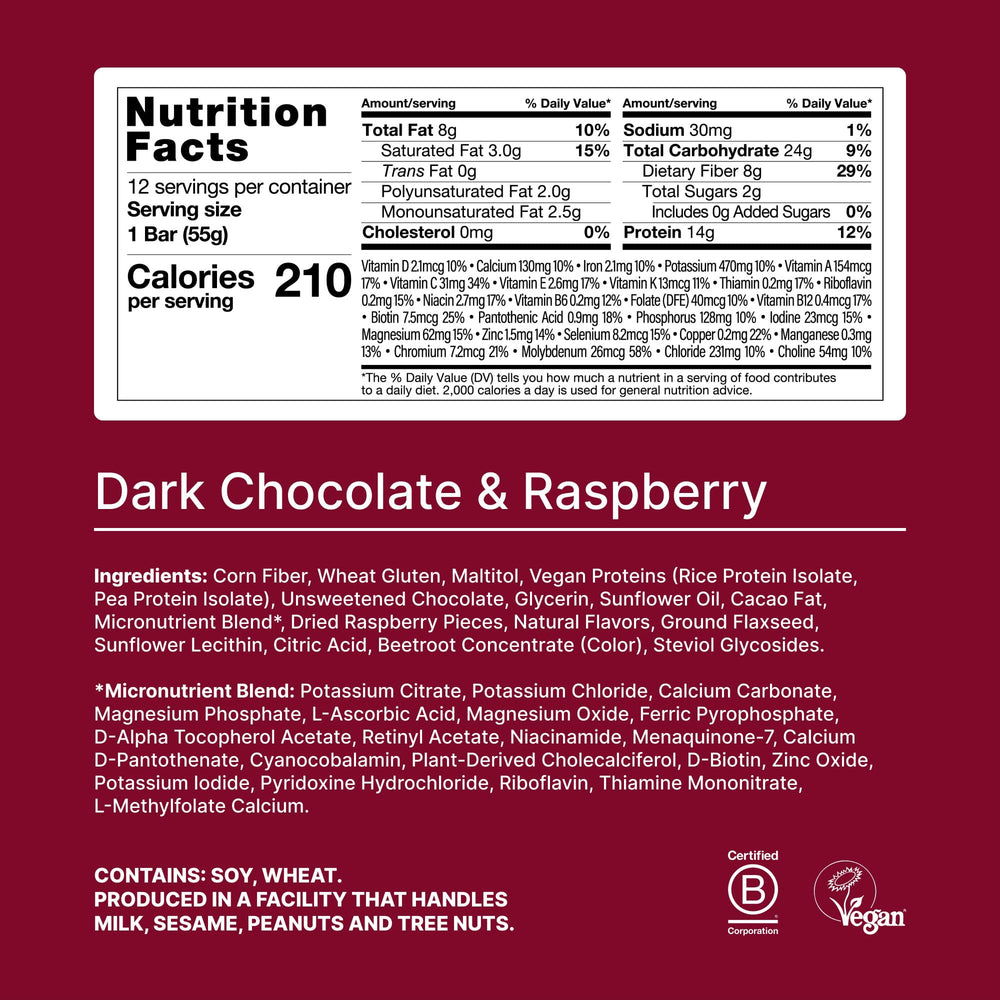Huel Complete Nutrition bar Dark Chocolate Raspberry vegan coating close-up shows coating and texture