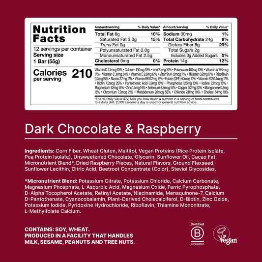 Huel Complete Nutrition bar Dark Chocolate Raspberry vegan coating close-up shows coating and texture