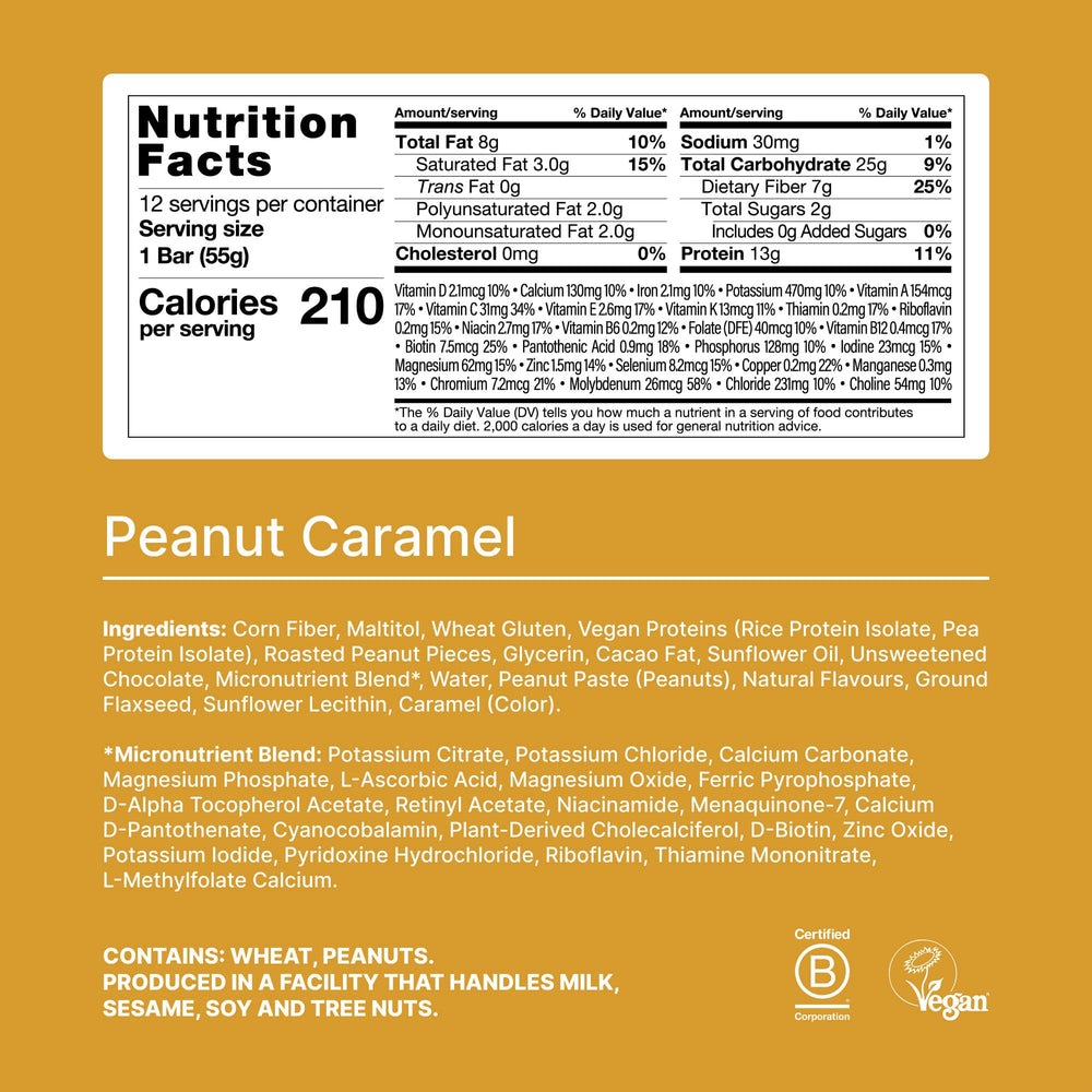 Close-up of Huel bar with peanut caramel and vegan coating.