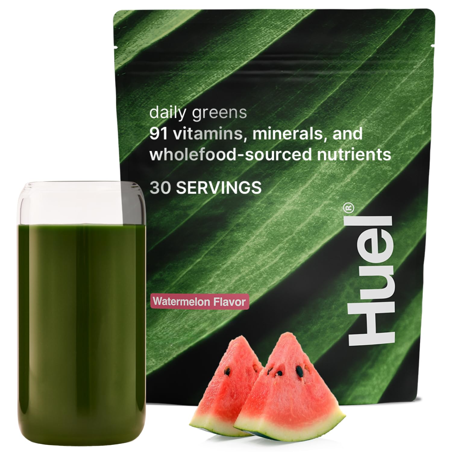 Huel Daily Greens Watermelon powder in a tub, ideal for a quick nutrient boost with breakfast.