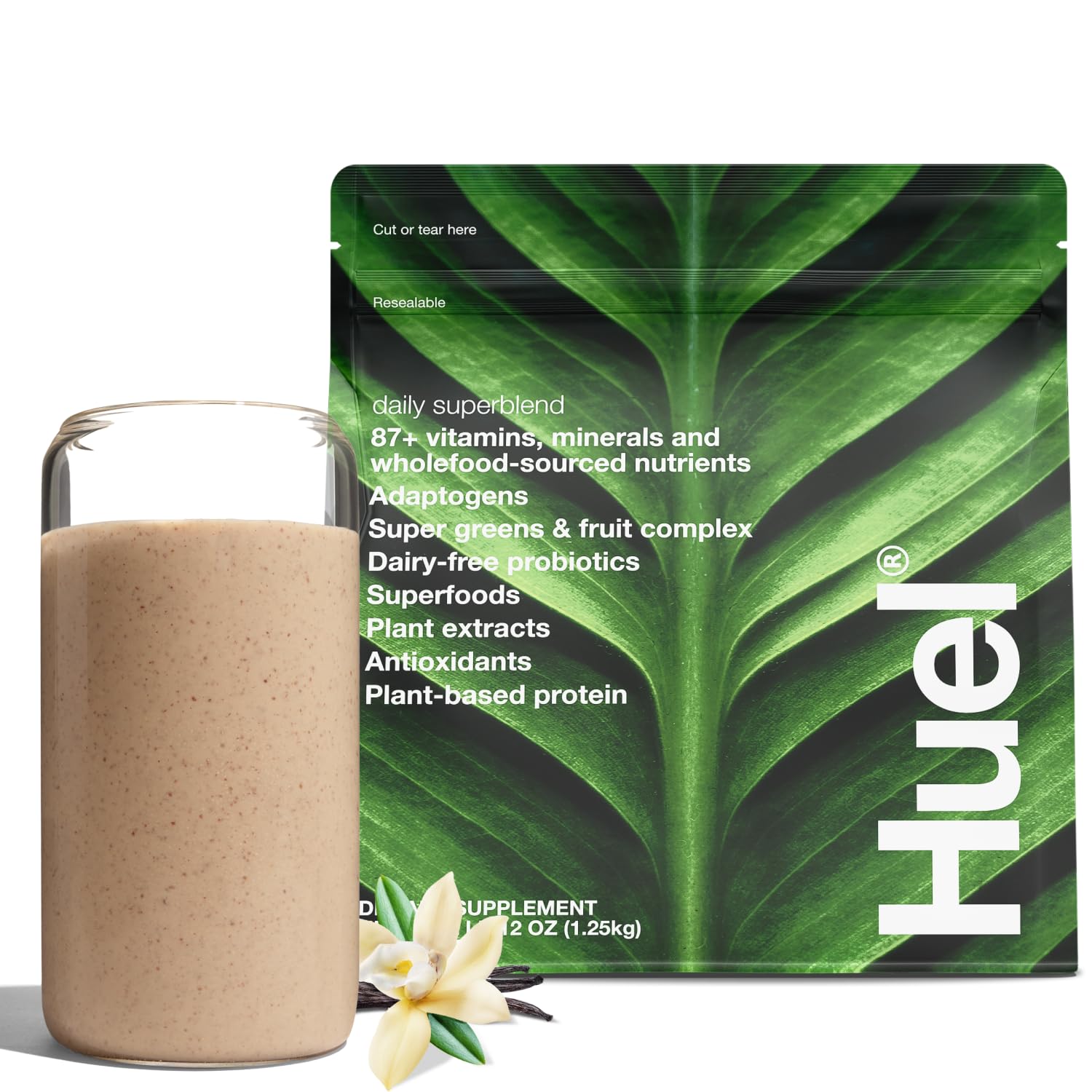 Huel Daily Superblend Vanilla tub with spoon, hinting at a balanced start to the day.