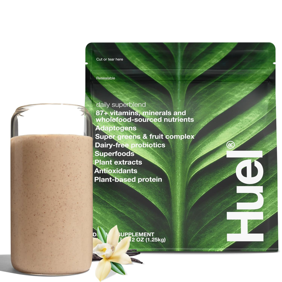 Huel Daily Superblend Vanilla tub with spoon, hinting at a balanced start to the day.