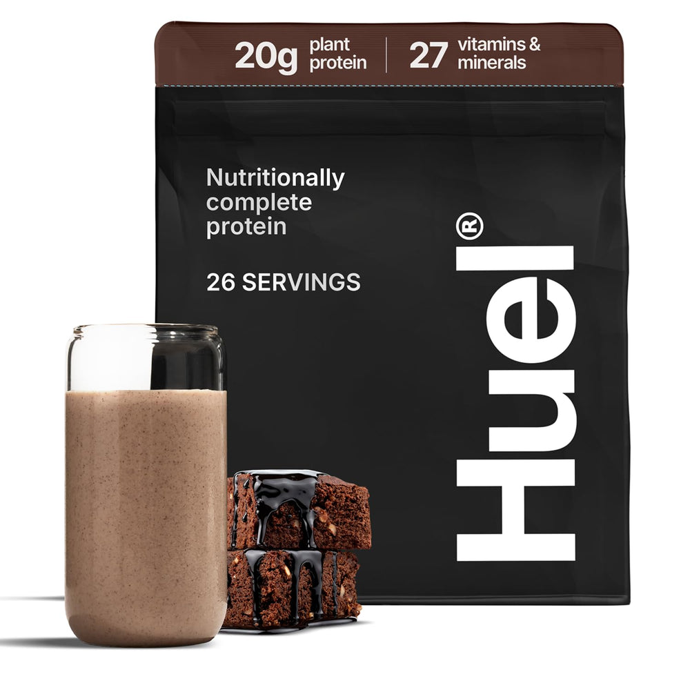 Huel vegan protein canister with chocolate fudge brownie flavor for complete plant nutrition.