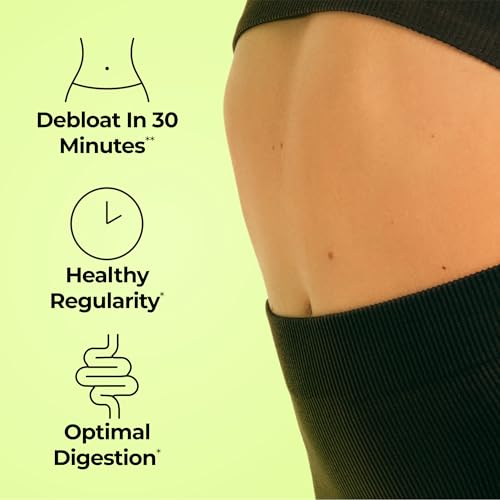 Close-up of HUM Flatter Me capsules highlighting enzyme blend for digestion.