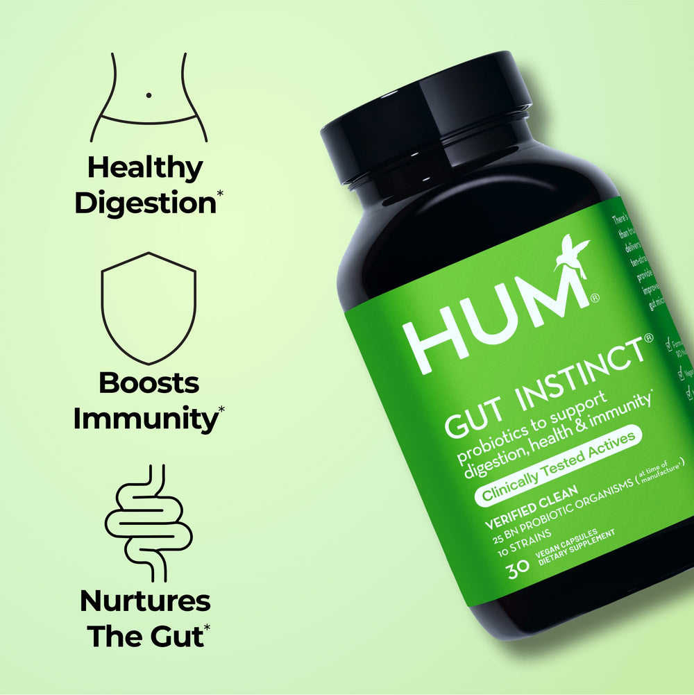 HUM Gut Instinct capsules close-up highlighting vegan-friendly probiotic formula.