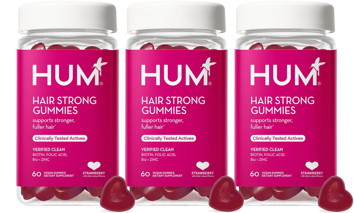 HUM Hair Strong daily gummies bottle for convenient growth support.