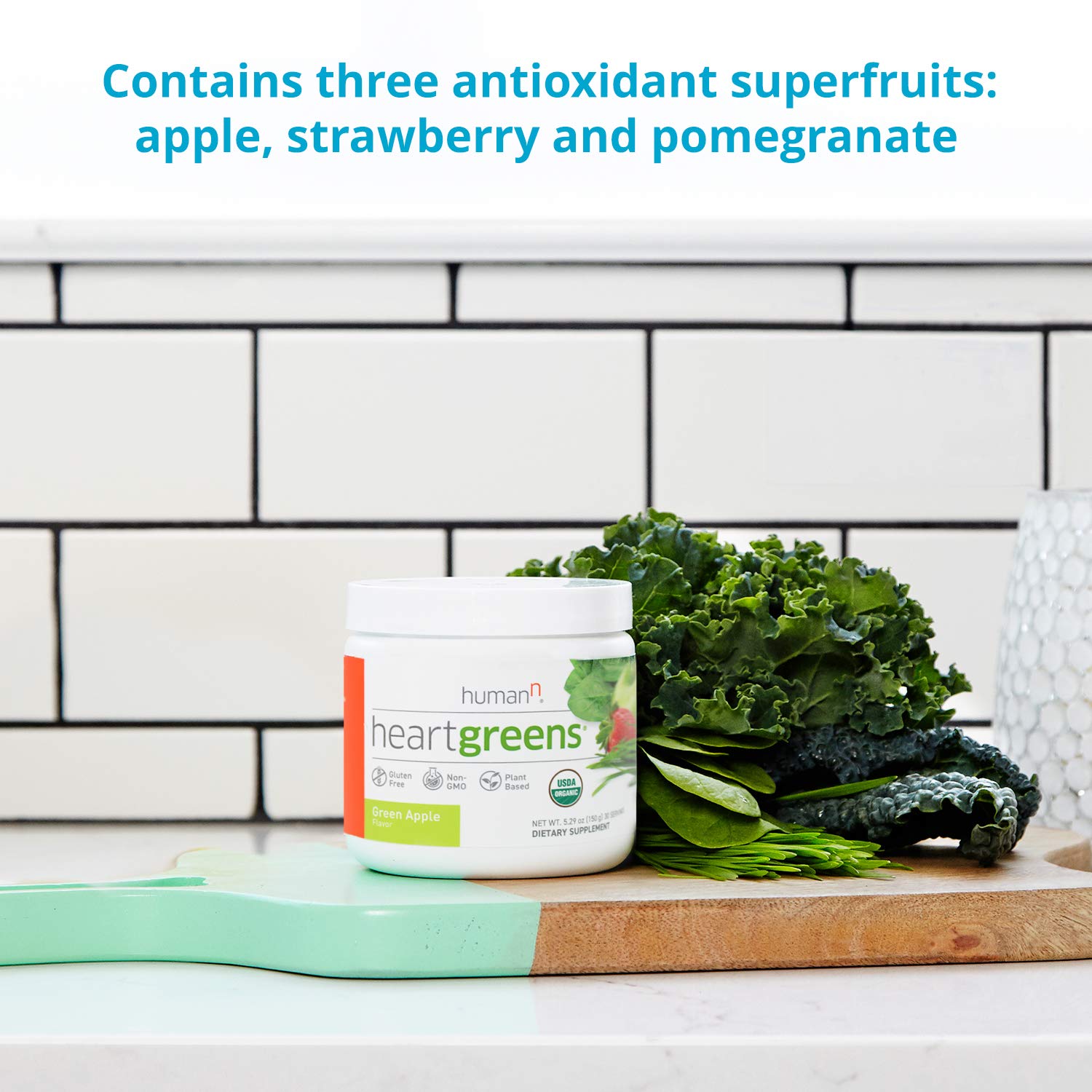 Humann HeartGreens powder blended into smoothie for a nutrient boost.
