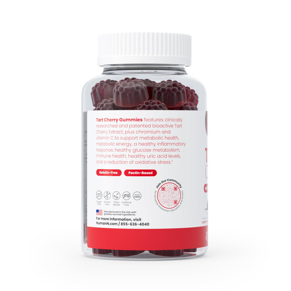 Humann Tart Cherry Gummies bottle dispensed, two gummies ready for daily routine.