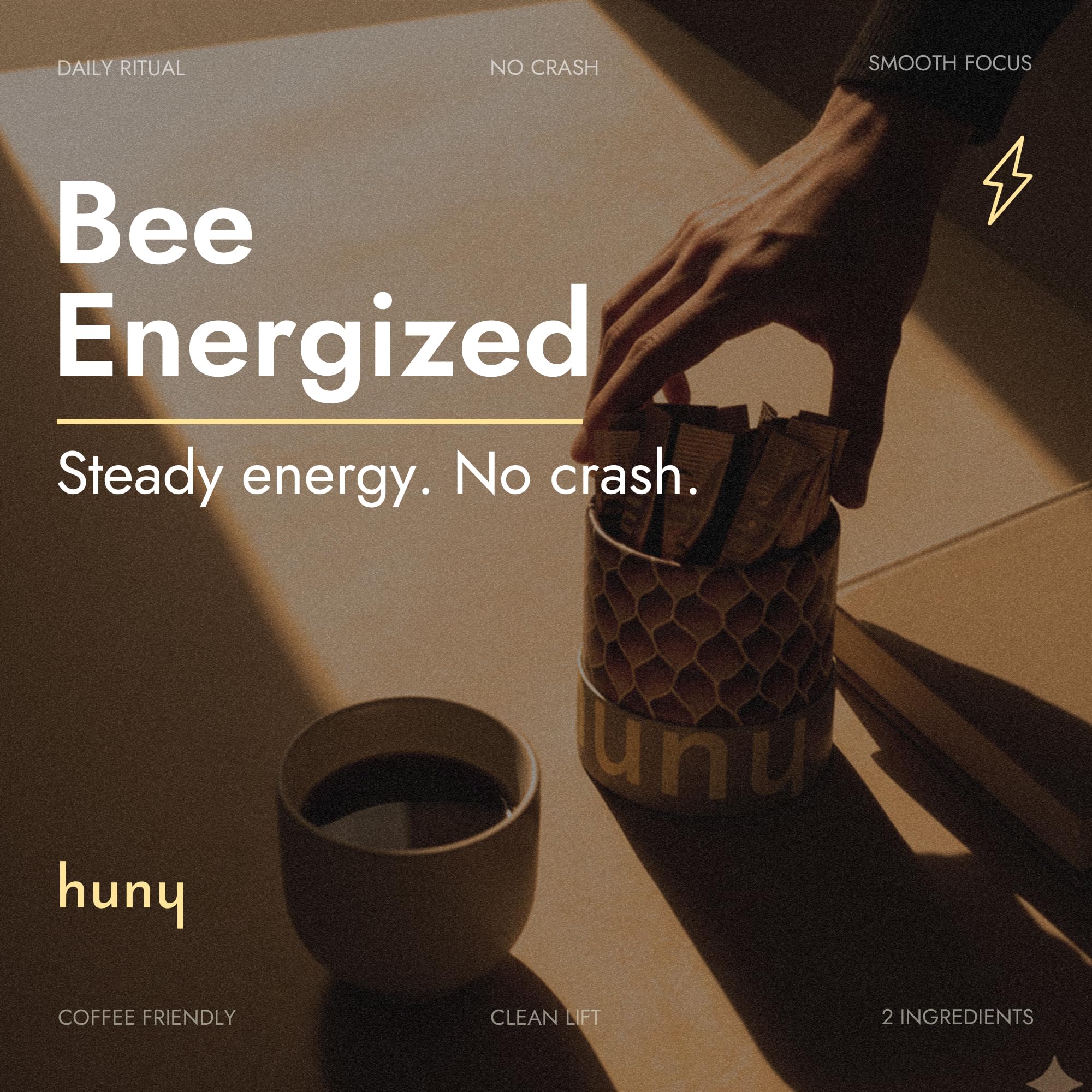 HUNY Bee Energized Shilajit Honey Stick closeup shows rich amber texture.