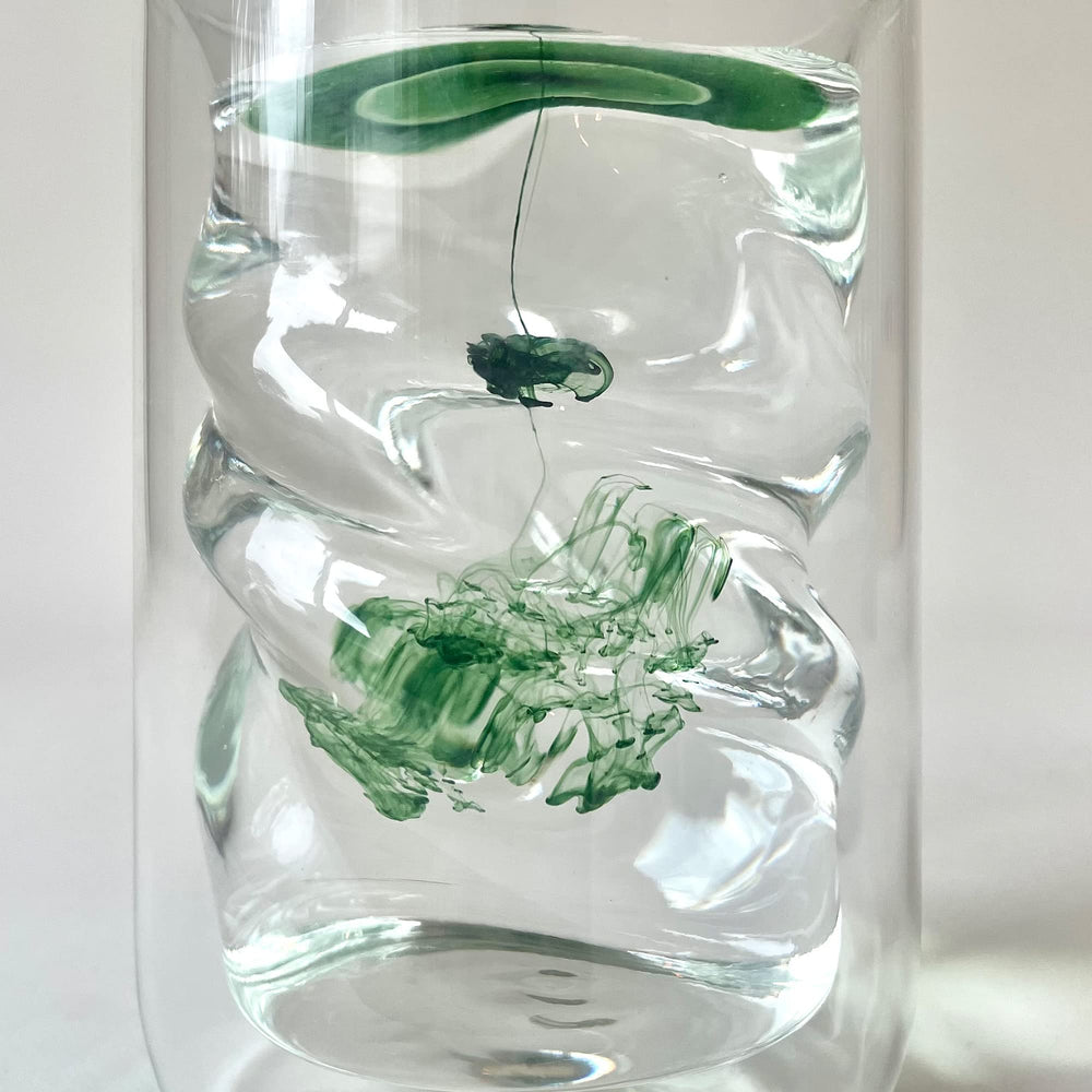 Juna bottle shows clean organic labeling and premium ingredients.
