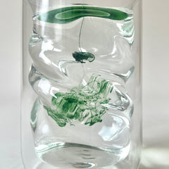 Juna bottle shows clean organic labeling and premium ingredients.