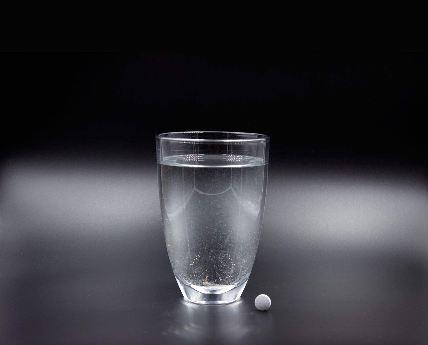 Hydrotab H2 glass with water, ready-to-consume beverage.