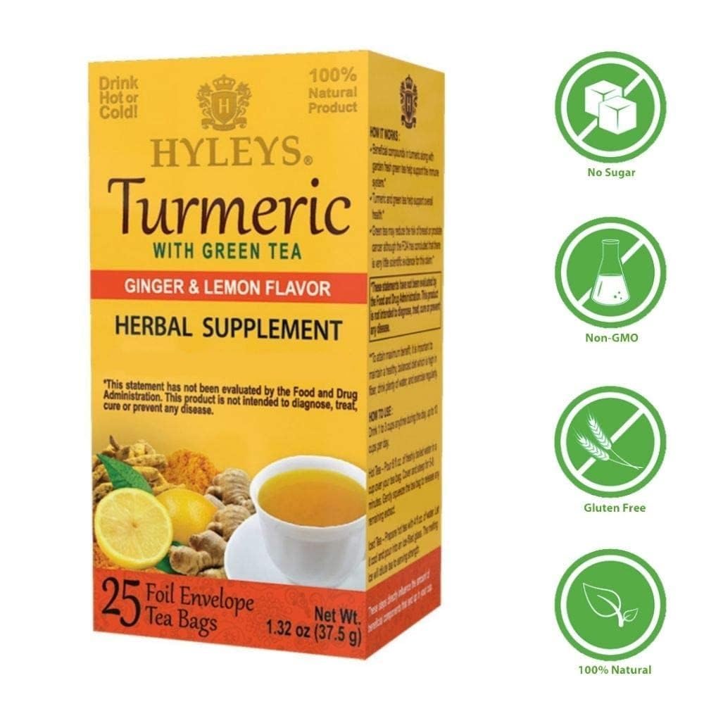 Hot cup of Hyleys Ginger Turmeric Tea releasing warm aroma.