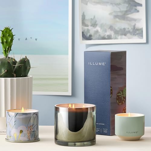 Illume Citrus Crush diffuser lifestyle desk setup with sunlit ambiance