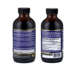 Measuring cup with Immunia concentrate for precise daily dosage.